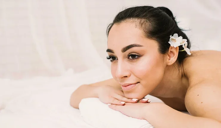 A guest relaxing during a spa session